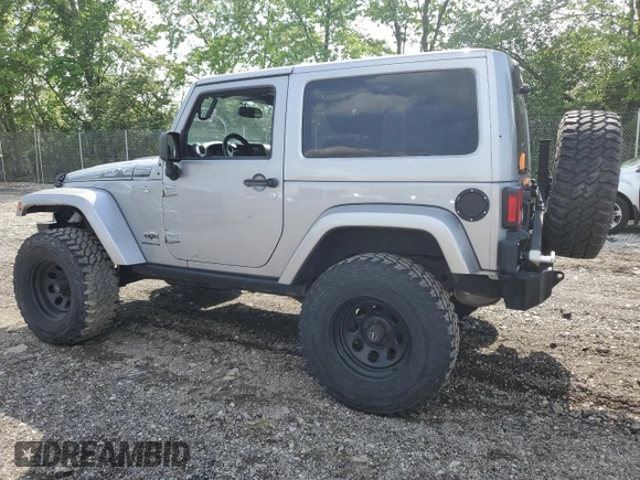 2014 Jeep Wrangler Sahara with VIN 1C4AJWBG0EL241643, listed as a Copart auction lot 56491155 with 113,596 mi miles and Salvage title. Bid and sale history available at DreamBid. Image 2.