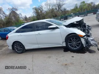 2019 Honda Civic EX z VIN 19XFC1F30KE208186, wystawiony jako IAAI lot #42020997 z przebiegiem 115 430 mil mil oraz . Historia ofert i sprzedaży dostępna na DreamBid. Obrazek 14.
