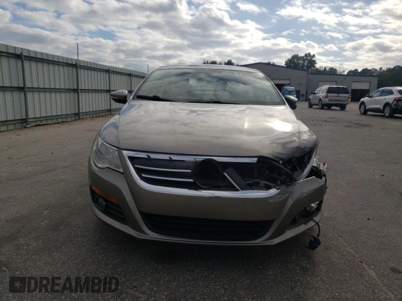 2011 Volkswagen CC Lux Plus with VIN WVWHN7AN1BE709436, listed as a Copart auction lot 77959964 with 165,213 mi miles and Salvage Title. Bid and sale history available at carsss.com. Image 5.