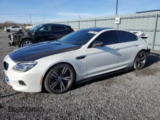 2017 BMW M6 z VIN WBS6E9C56HG437410, wystawiony jako Copart lot #80217694 z przebiegiem 68 335 mil mil oraz Szkody całkowita. Historia ofert i sprzedaży dostępna na DreamBid. Obrazek 1.