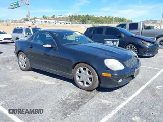 2003 Mercedes-Benz SLK-Class 2.3L with VIN WDBKK49F93F278493, listed as a IAAI auction lot 41665668 with 102,642 mi miles. Bid and sale history available at carsss.com. Image 1.