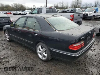 2001 Mercedes-Benz E-Class with VIN WDBJF70J31B324620, listed as a Copart auction lot 47748555 with 160,041 mi miles and Salvage Title. Bid and sale history available at carsss.com. Image 2.