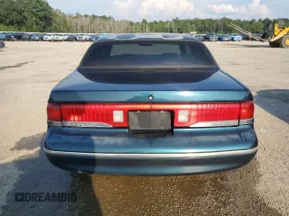 1996 Mercury Cougar z VIN 1MELM62W6TH629420, wystawiony jako Copart lot #67101634 z przebiegiem 71 996 mil mil oraz Szkody całkowita. Historia ofert i sprzedaży dostępna na DreamBid. Obrazek 6.