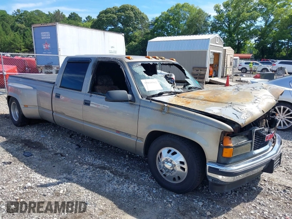 1999 GMC Sierra 3500 z VIN 1GTHC33J7XF036114, wystawiony jako IAAI lot #39848962 z przebiegiem Nie podano mil oraz . Historia ofert i sprzedaży dostępna na DreamBid. Obrazek 1.