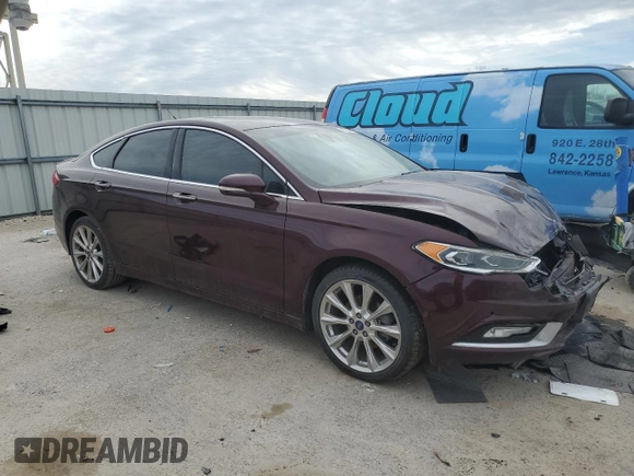 2017 Ford Fusion Titanium with VIN 3FA6P0D94HR345757, listed as a Copart auction lot 48789625 with 83,239 mi miles and Salvage title. Bid and sale history available at DreamBid. Image 4.