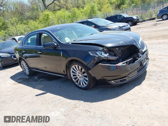 2013 Lincoln MKS z VIN 1LNHL9EK3DG617815, wystawiony jako IAAI lot #42239784 z przebiegiem 122 589 mil mil oraz . Historia ofert i sprzedaży dostępna na DreamBid. Obrazek 1.