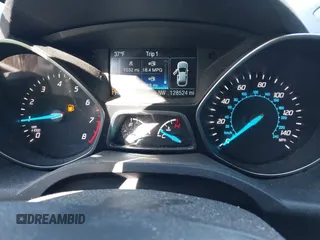 2015 Ford Escape SE with VIN 1FMCU9GX6FUB35649, listed as a IAAI auction lot 42055398 with 128,524 mi miles. Bid and sale history available at carsss.com. Image 7.