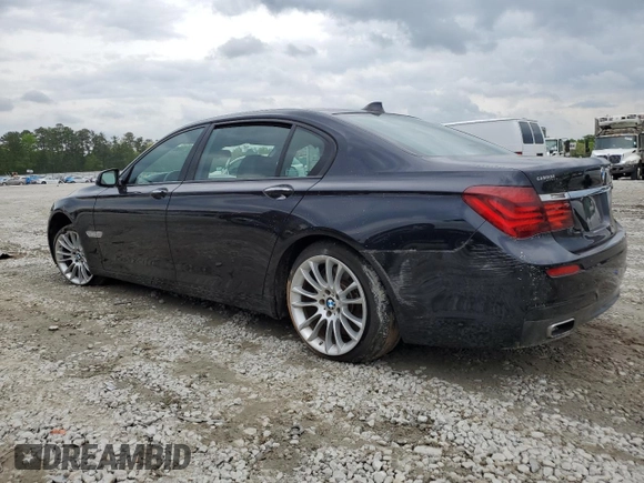 2015 BMW 7 Series 750Li with VIN WBAYE8C50FD781398, listed as a Copart auction lot 49519484 with 54,075 mi miles and Salvage Title. Bid and sale history available at carsss.com. Image 2.