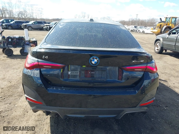 2024 BMW i4 xDrive40 with VIN WBY83FB04RFT19615, listed as a IAAI auction lot 41679918 with 3,883 mi miles. Bid and sale history available at carsss.com. Image 16.