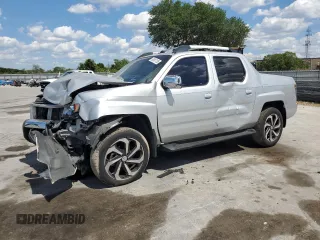 2006 Honda Ridgeline RTL with VIN 2HJYK16566H565360, listed as a Copart auction lot 50987135 with 267,724 mi miles and Salvage Title. Bid and sale history available at carsss.com. Image 1.