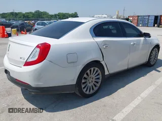2013 Lincoln MKS with VIN 1LNHL9DK2DG606838, listed as a IAAI auction lot 42454441 with 163,475 mi miles and . Bid and sale history available at DreamBid. Image 4.
