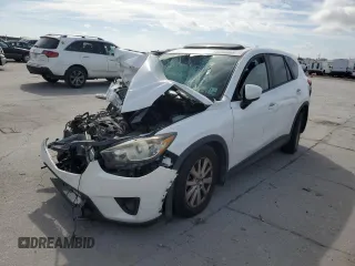 2013 Mazda CX-5 Touring with VIN JM3KE2CE9D0137982, listed as a Copart auction lot 43260805 with 0 mi miles and Salvage Title. Bid and sale history available at carsss.com. Image 1.