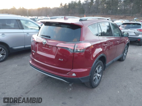 2018 Toyota RAV4 XLE with VIN 2T3WFREV3JW410080, listed as a IAAI auction lot 41329166 with 94,312 mi miles. Bid and sale history available at carsss.com. Image 4.