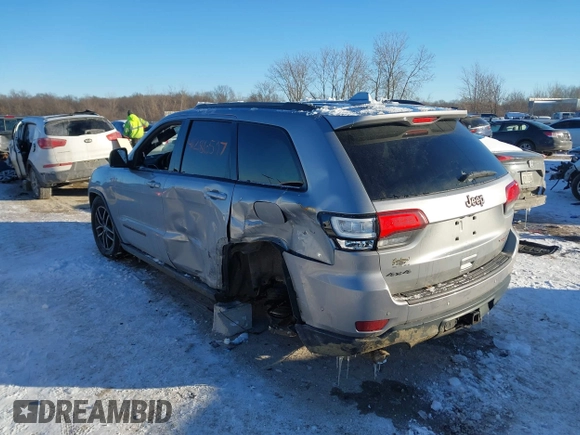 2017 Jeep Grand Cherokee Trailhawk with VIN 1C4RJFLT4HC657682, listed as a IAAI auction lot 41286507 with 123,646 mi miles and . Bid and sale history available at DreamBid. Image 3.