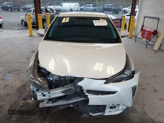 2019 Toyota Prius LE with VIN JTDL9RFU1K3009518, listed as a IAAI auction lot 41262569 with 59,828 mi miles and . Bid and sale history available at DreamBid. Image 13.