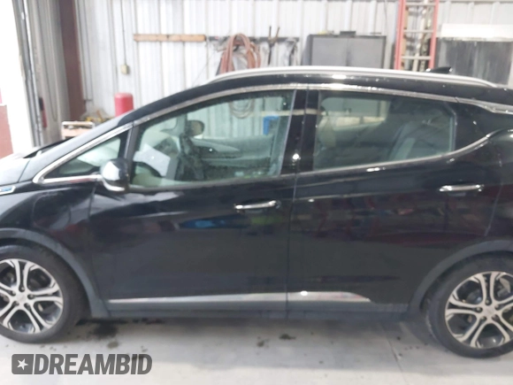 2019 Chevrolet Bolt EV Premier with VIN 1G1FZ6S09K4106306, listed as a IAAI auction lot 41947642 with 90,952 mi miles and . Bid and sale history available at DreamBid. Image 14.