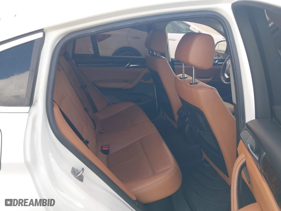 2015 BMW X4 xDrive28i with VIN 5UXXW3C53F0M88714, listed as a IAAI auction lot 41483692 with 132,054 mi miles. Bid and sale history available at carsss.com. Image 8.