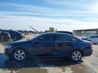 2012 Volkswagen Passat SE w/Sunroof with VIN 1VWBH7A35CC077207, listed as a IAAI auction lot 41351317 with 136,904 mi miles. Bid and sale history available at carsss.com. Image 14.