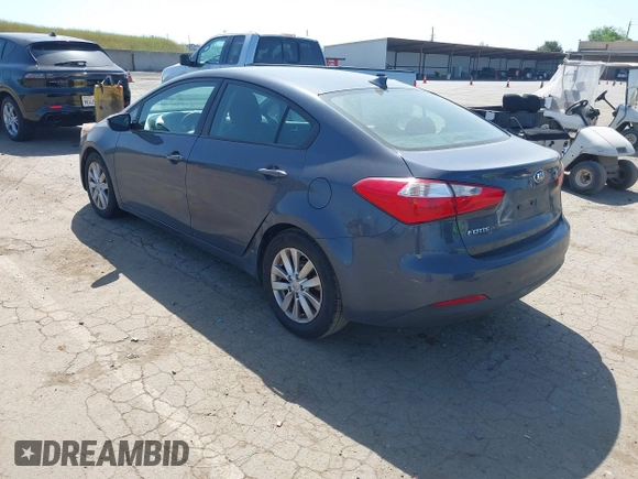 2015 Kia Forte LX with VIN KNAFX4A61F5354649, listed as a IAAI auction lot 42040586 with 113,436 mi miles. Bid and sale history available at carsss.com. Image 3.
