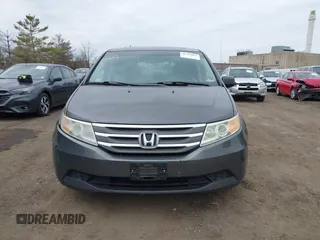 2012 Honda Odyssey EX-L with VIN 5FNRL5H65CB042898, listed as a IAAI auction lot 41784075 with 179,596 mi miles and . Bid and sale history available at carsss.com. Image 12.