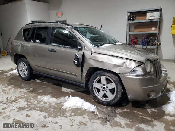 2008 Jeep Compass Sport with VIN 1J8FF47W48D642664, listed as a Copart auction lot 45213485 with 215,009 mi miles and Salvage Title. Bid and sale history available at carsss.com. Image 4.
