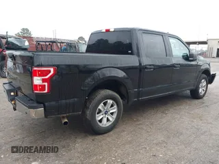2019 Ford F-150 XL with VIN 1FTEW1C57KKD51657, listed as a IAAI auction lot 41426305 with 150,471 mi miles and . Bid and sale history available at DreamBid. Image 4.