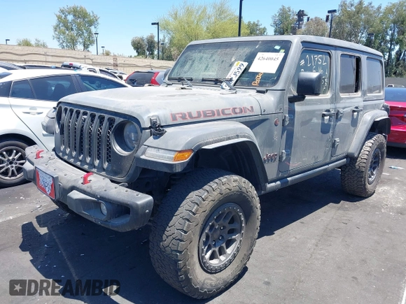 2023 Jeep Wrangler Rubicon with VIN 1C4JJXFG7PW541813, listed as a IAAI auction lot 42640045 with 53,645 mi miles and . Bid and sale history available at DreamBid. Image 2.