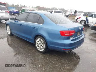 2015 Volkswagen Jetta Sedan 1.8T SE w/Connectivity with VIN 3VWD07AJ9FM329266, listed as a IAAI auction lot 41608542 with 150,476 mi miles. Bid and sale history available at carsss.com. Image 3.