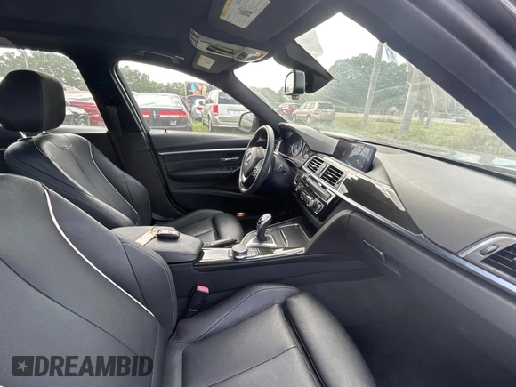 2017 BMW 3 Series 330i xDrive with VIN WBA8K3C38HA022948, listed as a Copart auction lot 51872485 with 34,232 mi miles and Clean Title. Bid and sale history available at carsss.com. Image 5.