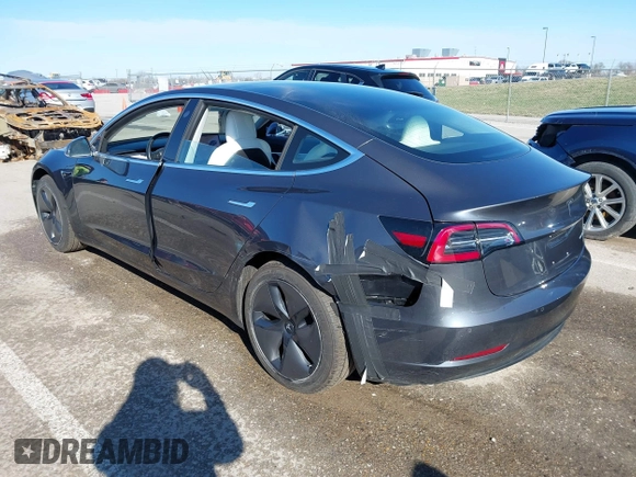 2018 Tesla Model 3 Long Range Battery with VIN 5YJ3E1EB6JF122167, listed as a IAAI auction lot 41761710 with 76,199 mi miles and . Bid and sale history available at DreamBid. Image 3.