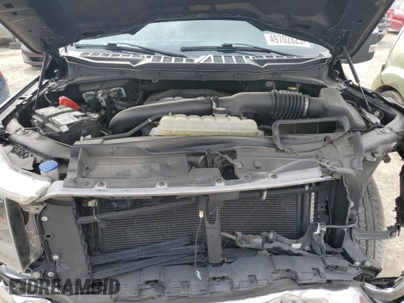 2021 Ford F-150 XL with VIN 1FTFW1E83MFB66545, listed as a Copart auction lot 49702825 with 84,078 mi miles and Salvage title. Bid and sale history available at DreamBid. Image 12.