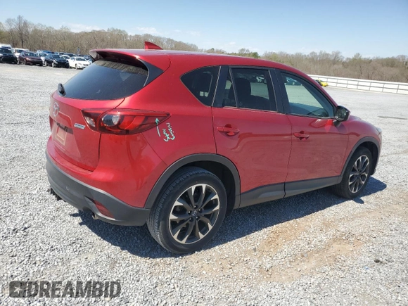 2016 Mazda CX-5 Grand Touring z VIN JM3KE2DYXG0840777, wystawiony jako Copart lot #49700585 z przebiegiem 116 469 mil mil oraz Szkoda całkowita • Salvage title. Historia ofert i sprzedaży dostępna na DreamBid. Obrazek 3.