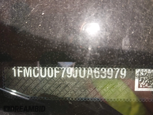 2018 Ford Escape S z VIN 1FMCU0F79JUA63979, wystawiony jako IAAI lot #42184819 z przebiegiem 125 720 mil mil oraz . Historia ofert i sprzedaży dostępna na DreamBid. Obrazek 9.