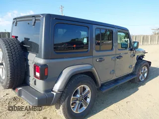 2018 Jeep Wrangler Unlimited Sahara with VIN 1C4HJXEN9JW303094, listed as a IAAI auction lot 41491564 with 66,128 mi miles and . Bid and sale history available at DreamBid. Image 4.