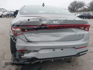 2024 Kia K5 GT-Line z VIN 5XXG64J29RG237148, wystawiony jako IAAI lot #41396574 z przebiegiem 22 926 mil mil oraz . Historia ofert i sprzedaży dostępna na DreamBid. Obrazek 6.