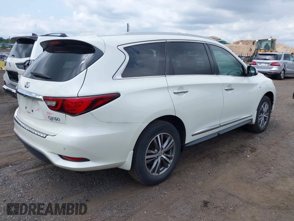 2020 Infiniti QX60 Luxe with VIN 5N1DL0MM2LC506031, listed as a IAAI auction lot 42701561 with 31,424 mi miles and . Bid and sale history available at DreamBid. Image 4.