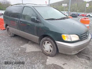 2001 Toyota Sienna LE with VIN 4T3ZF13C71U351289, listed as a IAAI auction lot 41966579 with 254,740 mi miles. Bid and sale history available at carsss.com. Image 1.
