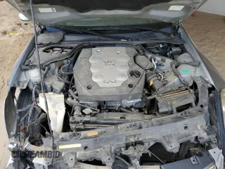 2005 Infiniti G35 z VIN JNKCV51E85M203254, wystawiony jako Copart lot #48826565 z przebiegiem 217 479 mil mil oraz Szkoda całkowita • Salvage title. Historia ofert i sprzedaży dostępna na DreamBid. Obrazek 11.