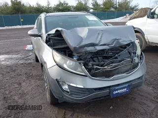 2013 Kia Sportage EX z VIN KNDPC3A2XD7470606, wystawiony jako IAAI lot #41647230 z przebiegiem 144 239 mil mil oraz . Historia ofert i sprzedaży dostępna na DreamBid. Obrazek 1.