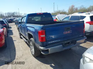 2019 GMC Sierra 1500 SLE z VIN 2GTV2MEC5K1102900, wystawiony jako IAAI lot #41996612 z przebiegiem 69 502 mil mil oraz . Historia ofert i sprzedaży dostępna na DreamBid. Obrazek 3.
