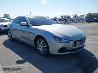 2014 Maserati Ghibli S Q4 with VIN ZAM57RTA8E1095317, listed as a IAAI auction lot 41866454 with 120,645 mi miles. Bid and sale history available at carsss.com. Image 1.