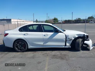 2023 BMW 3 Series 330e with VIN 3MW39FF02P8C89795, listed as a IAAI auction lot 41648172 with 27,179 mi miles. Bid and sale history available at carsss.com. Image 13.