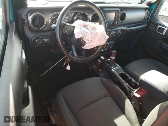 2020 Jeep Wrangler Willys z VIN 1C4GJXAG7LW260669, wystawiony jako Copart lot #57472685 z przebiegiem 21 075 mil mil oraz Szkoda całkowita • Salvage title. Historia ofert i sprzedaży dostępna na DreamBid. Obrazek 8.