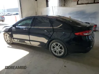 2018 Ford Fusion SE z VIN 3FA6P0HDXJR130677, wystawiony jako Copart lot #51737345 z przebiegiem 129 918 mil mil oraz Szkoda całkowita • Salvage title. Historia ofert i sprzedaży dostępna na DreamBid. Obrazek 2.