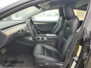 2022 Tesla Model 3 with VIN 5YJ3E1EA0NF372095, listed as a Copart auction lot 54958215 with 148,441 mi miles and Clean Title. Bid and sale history available at DreamBid. Image 7.