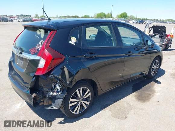 2016 Honda Fit EX with VIN JHMGK5H74GX042436, listed as a IAAI auction lot 42227520 with 106,777 mi miles and . Bid and sale history available at DreamBid. Image 4.