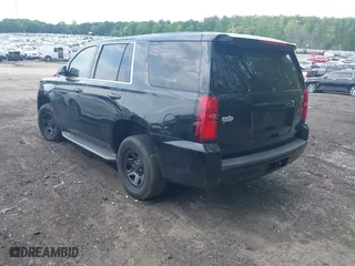 2019 Chevrolet Tahoe Commercial with VIN 1GNLCDECXKR208052, listed as a IAAI auction lot 42014348 with 96,455 mi miles. Bid and sale history available at carsss.com. Image 3.