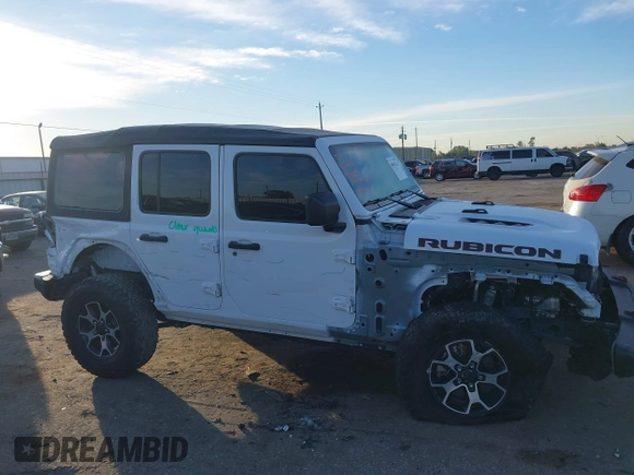 2022 Jeep Wrangler Unlimited Rubicon with VIN 1C4HJXFN4NW123803, listed as a IAAI auction lot 40994742 with 36,156 mi miles and . Bid and sale history available at DreamBid. Image 13.