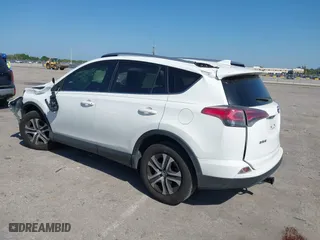 2017 Toyota RAV4 LE with VIN JTMZFREV7HJ143483, listed as a IAAI auction lot 41804683 with 129,319 mi miles. Bid and sale history available at carsss.com. Image 3.