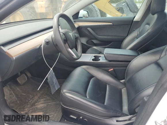 2021 Tesla Model 3 Standard Range Plus z VIN 5YJ3E1EAXMF973450, wystawiony jako Copart lot #52766645 z przebiegiem 66 827 mil mil oraz Szkoda całkowita • Salvage title. Historia ofert i sprzedaży dostępna na DreamBid. Obrazek 7.